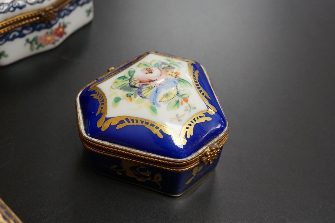 A collection of Continental hand painted and enamelled patch boxes, largest 9cm wide